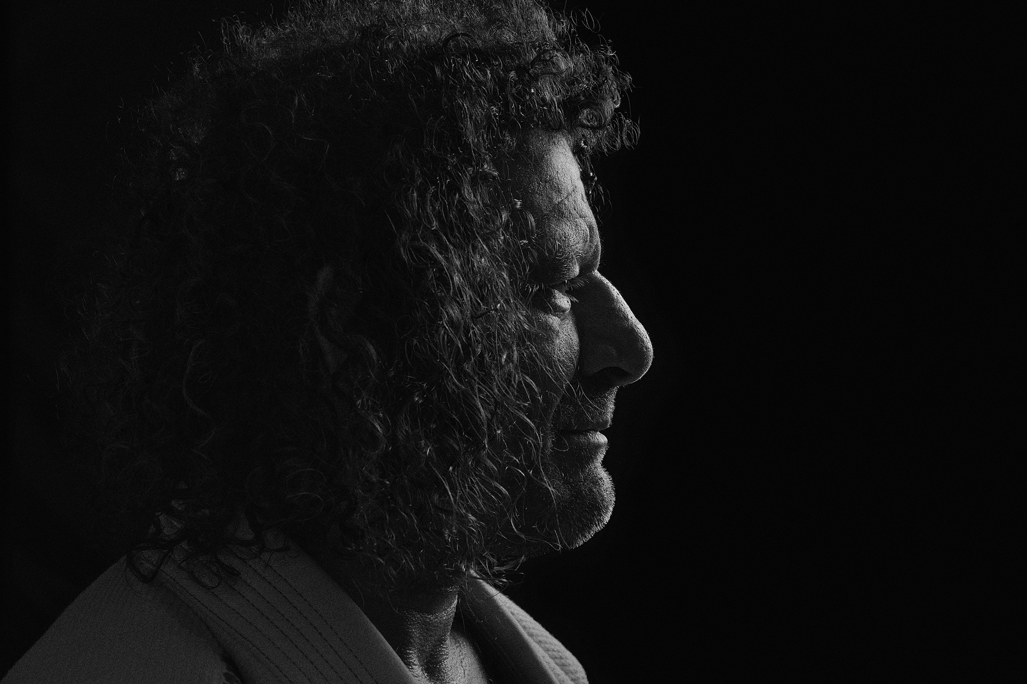 dramatic black and white one light portrait of male athlete kurt osiander from LA by Brent Young Photography
